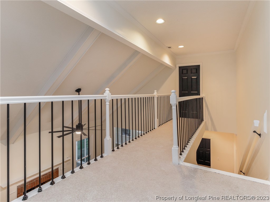6915 South Staff Road Fayetteville, NC 28306 - Photo 17 of 23 a view of a hallway with wooden floor