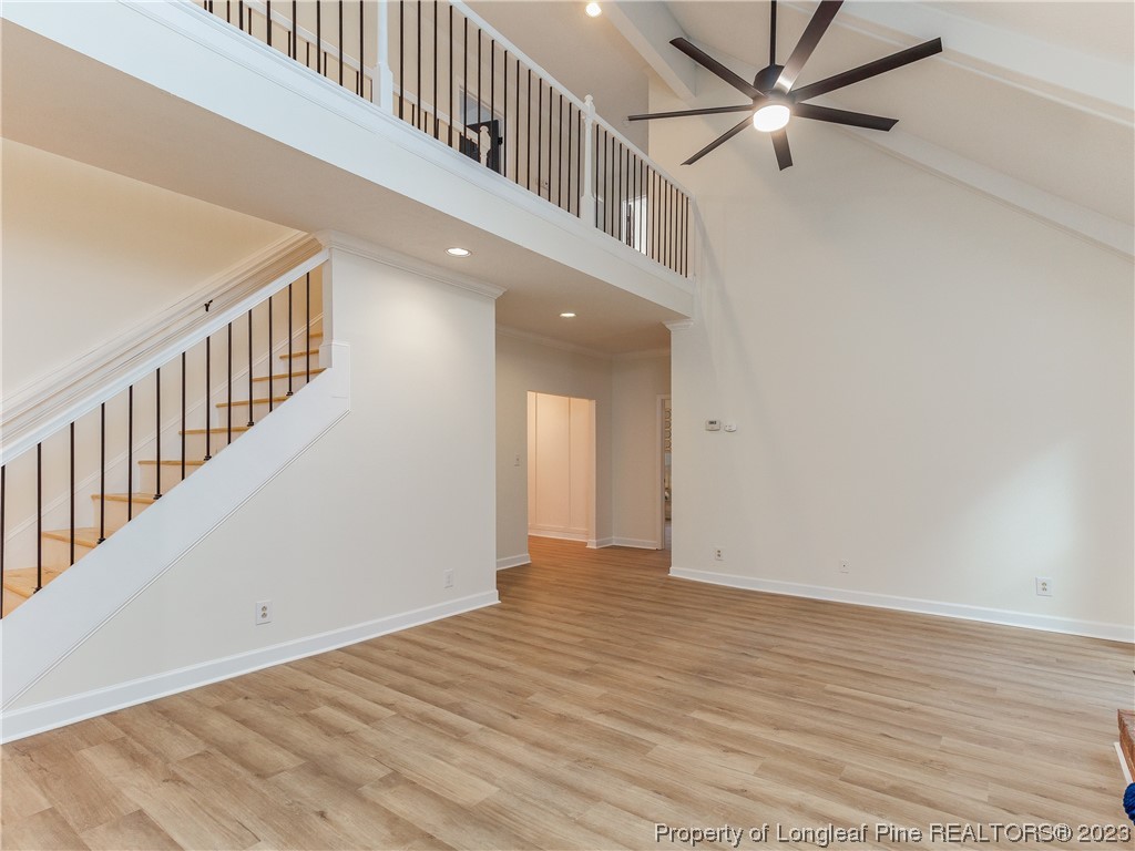 6915 South Staff Road Fayetteville, NC 28306 - Photo 7 of 23 a view of an entryway with wooden floor