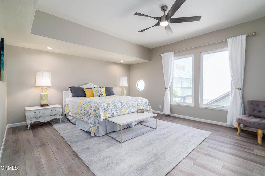 117 Santa Cruz Avenue Oxnard, CA 93035 - Photo 14 of 35 a bed room with a bed and a chair