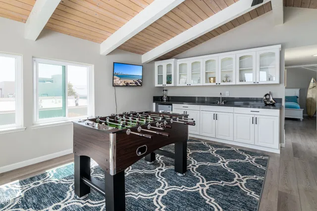 a kitchen with a table and chairs in it