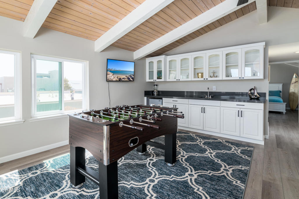 117 Santa Cruz Avenue Oxnard, CA 93035 - Photo 21 of 35 a kitchen with a table and chairs in it