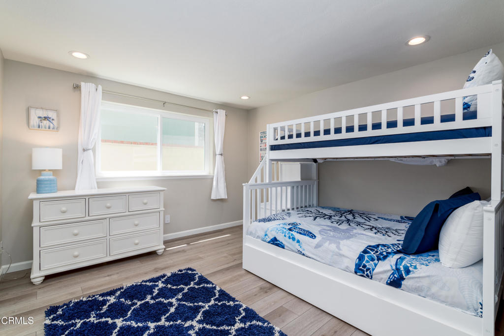 117 Santa Cruz Avenue Oxnard, CA 93035 - Photo 28 of 35 a bedroom with a bed and a window