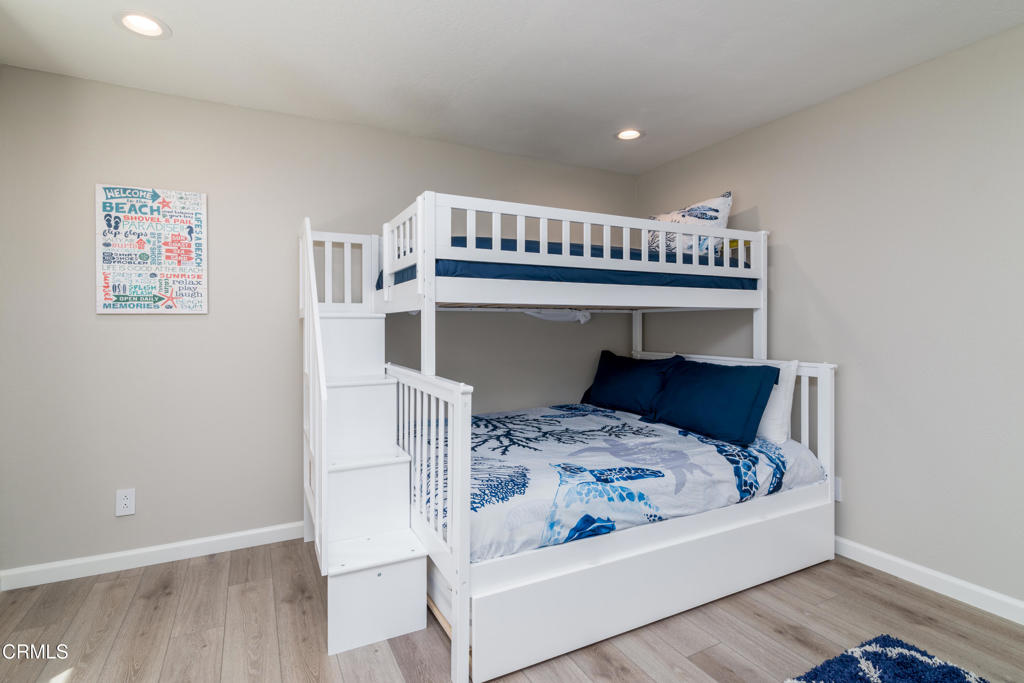 117 Santa Cruz Avenue Oxnard, CA 93035 - Photo 29 of 35 a view of bedroom with furniture and wooden floor