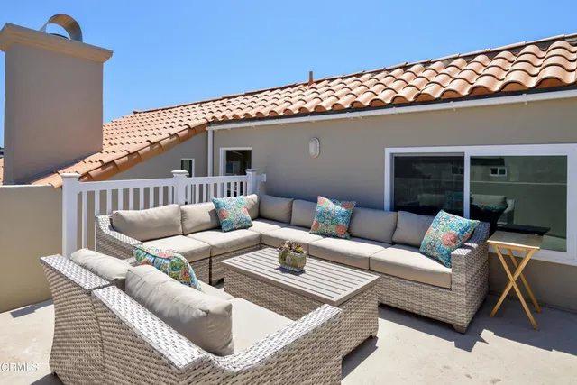 a building outdoor space with patio couch