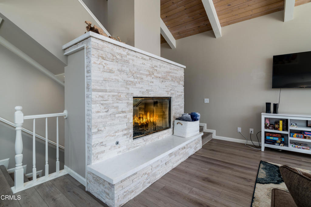 117 Santa Cruz Avenue Oxnard, CA 93035 - Photo 9 of 35 a living room with furniture and a fireplace