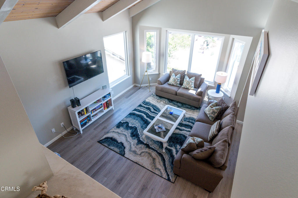 117 Santa Cruz Avenue Oxnard, CA 93035 - Photo 10 of 35 a living room with furniture and a flat screen tv