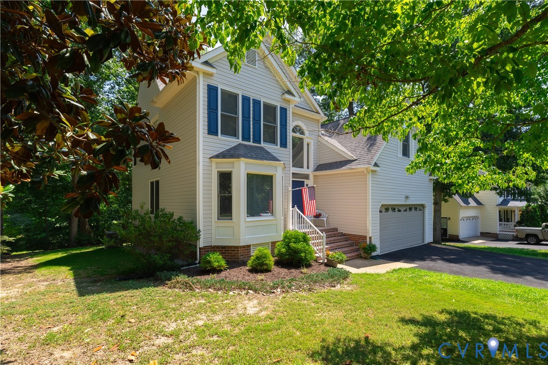 4501 Foxwood Road Chester, VA 23831 - Photo 4 of 42 Traditional two-story residence featuring light-co