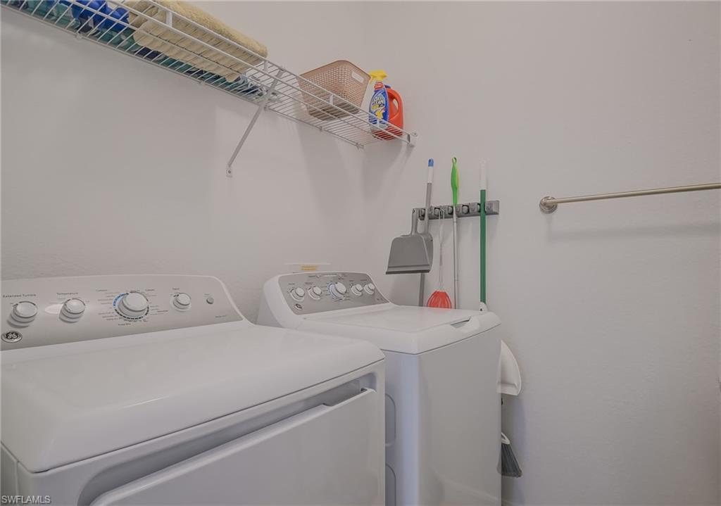 1774 Alameda Drive Naples, FL 34120 - Photo 17 of 29 a utility room with dryer and washer
