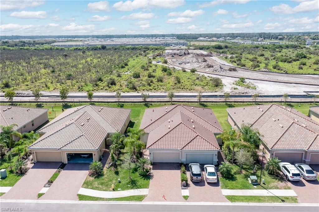 1774 Alameda Drive Naples, FL 34120 - Photo 20 of 29 a view of outdoor space and yard
