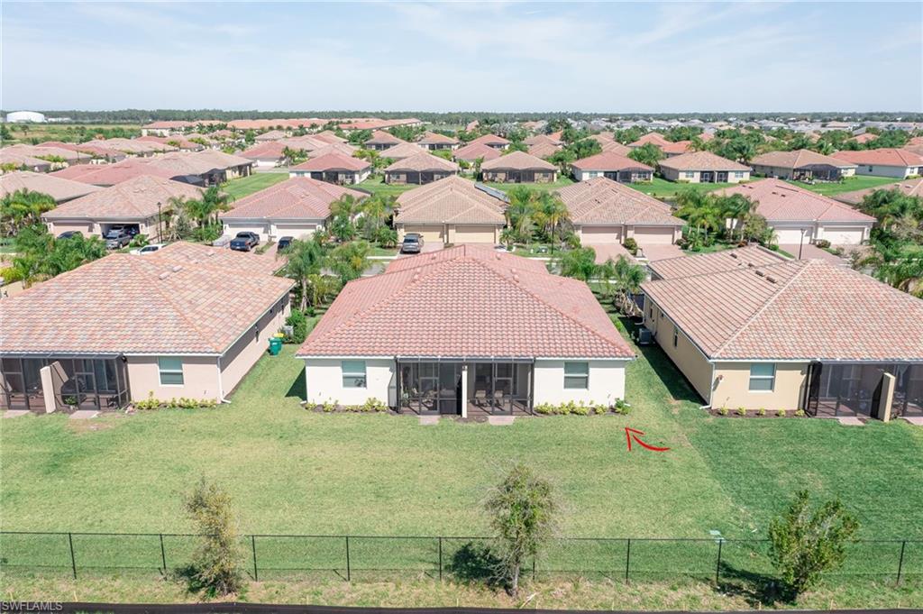 1774 Alameda Drive Naples, FL 34120 - Photo 22 of 29 an aerial view of a house with a garden