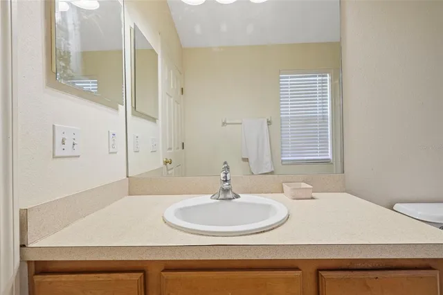 a bathroom with a shower and toilet