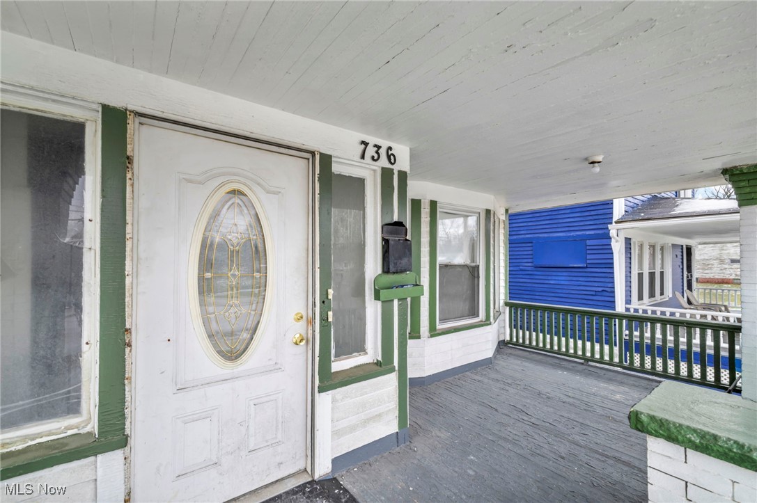 738 Eddy Road Cleveland, OH 44108 - Photo 3 of 33 Doorway to property with a porch