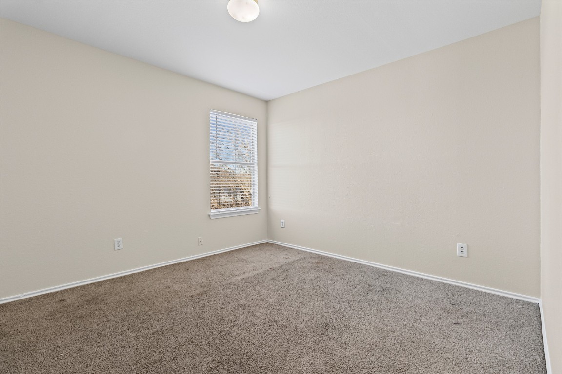 12700 St Mary Drive Manor, TX 78653 - Photo 15 of 17 an empty room with a window