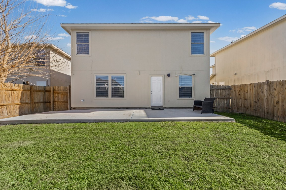 12700 St Mary Drive Manor, TX 78653 - Photo 17 of 17 a house view with a garden space