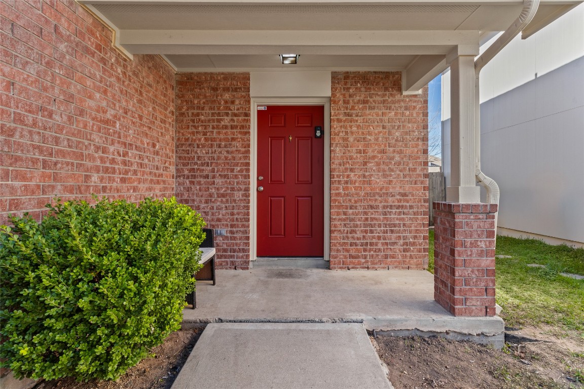 12700 St Mary Drive Manor, TX 78653 - Photo 3 of 17 a front view of a house with a yard