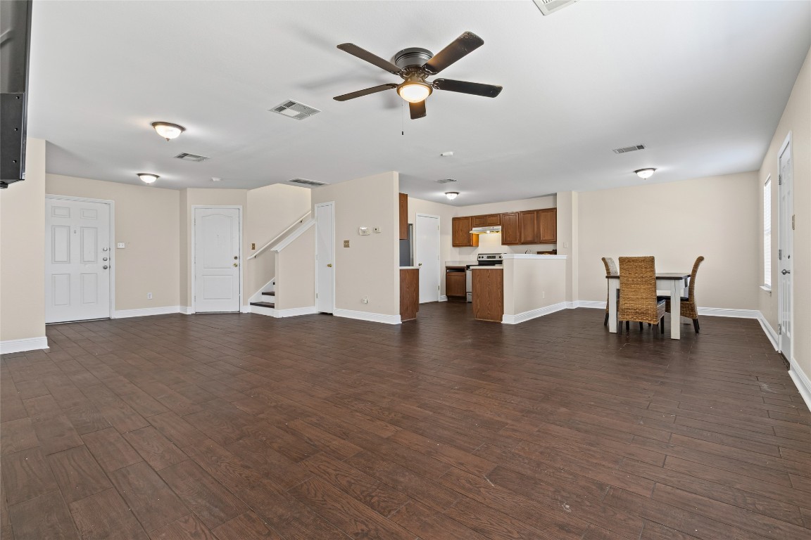 12700 St Mary Drive Manor, TX 78653 - Photo 5 of 17 a view of a livingroom with furniture and a ceiling fan