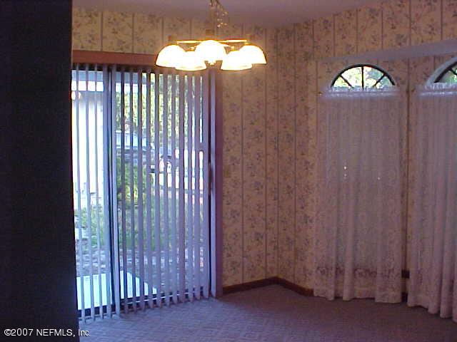 10164 Lone Star Road Jacksonville, FL 32225 - Photo 3 of 11 formal dining with bay window