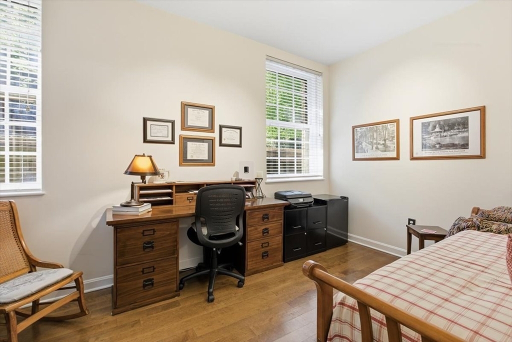 65 Glen Road, Unit H1 Brookline, MA 02445 - Photo 29 of 39 a view of a workspace with furniture and a window