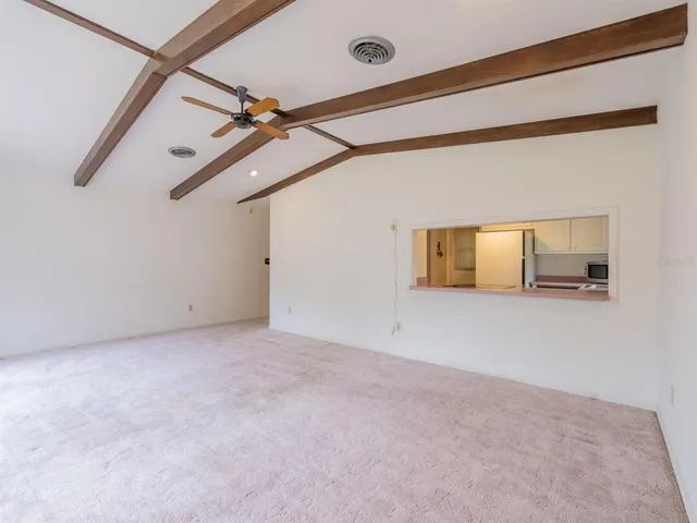 a view of a room with a hallway