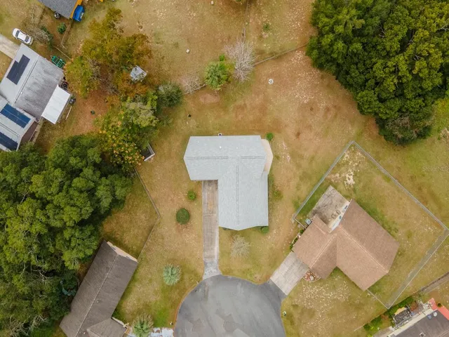 a view of an empty room with a large window