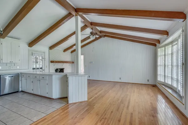 a view of cabinets and wooden floor