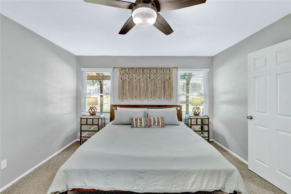 2609 Quail Ridge Irving, TX 75060 - Photo 14 of 39 a bedroom with a bed and window