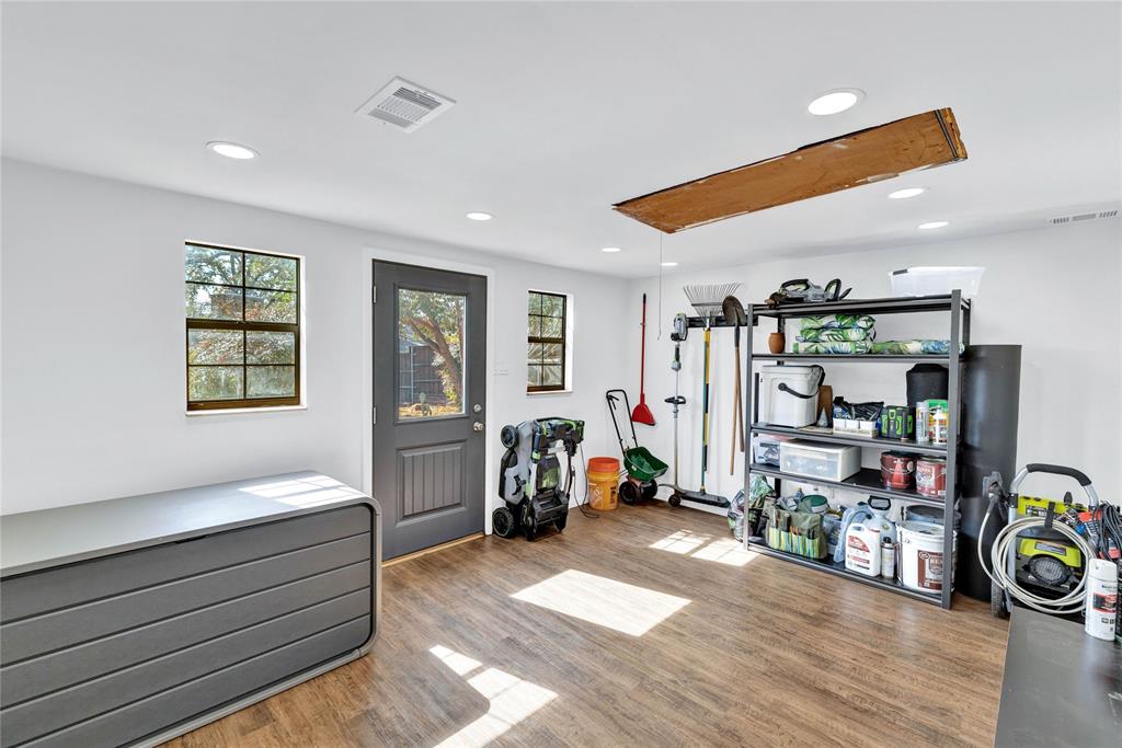 2609 Quail Ridge Irving, TX 75060 - Photo 30 of 39 a bedroom with furniture and a window