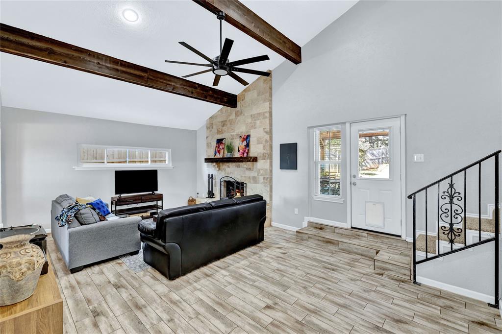 2609 Quail Ridge Irving, TX 75060 - Photo 6 of 39 a living room with furniture and a flat screen tv