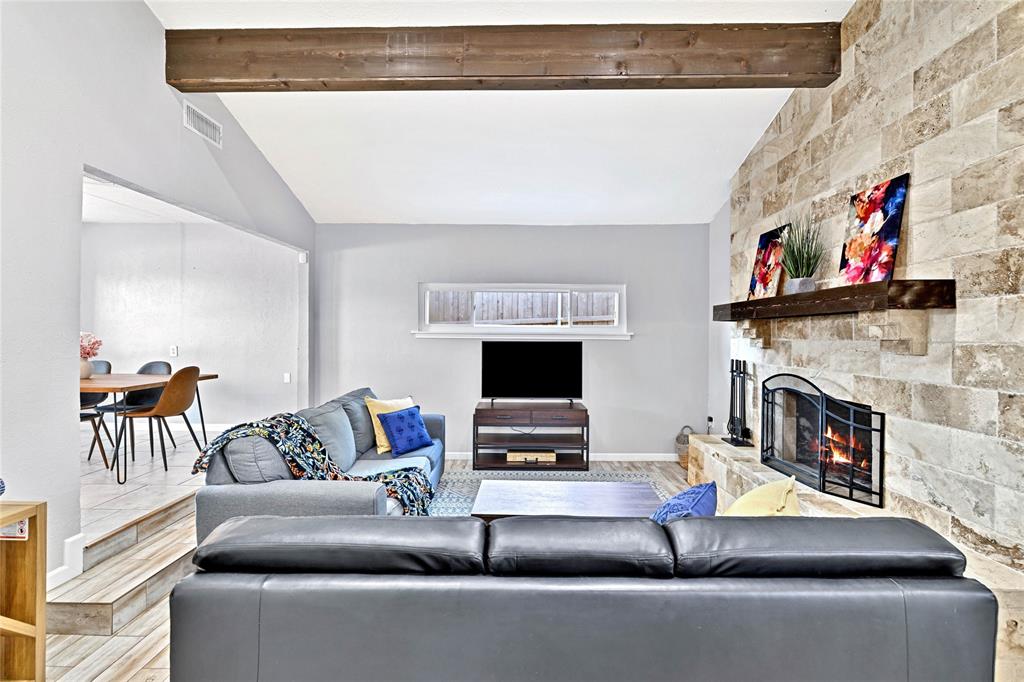 2609 Quail Ridge Irving, TX 75060 - Photo 7 of 39 a living room with furniture and a fireplace