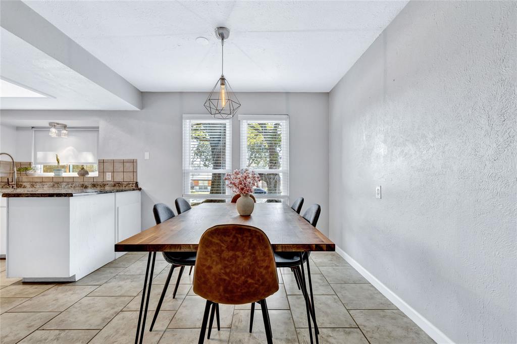 2609 Quail Ridge Irving, TX 75060 - Photo 9 of 39 a view of a dining room with furniture window and wooden floor