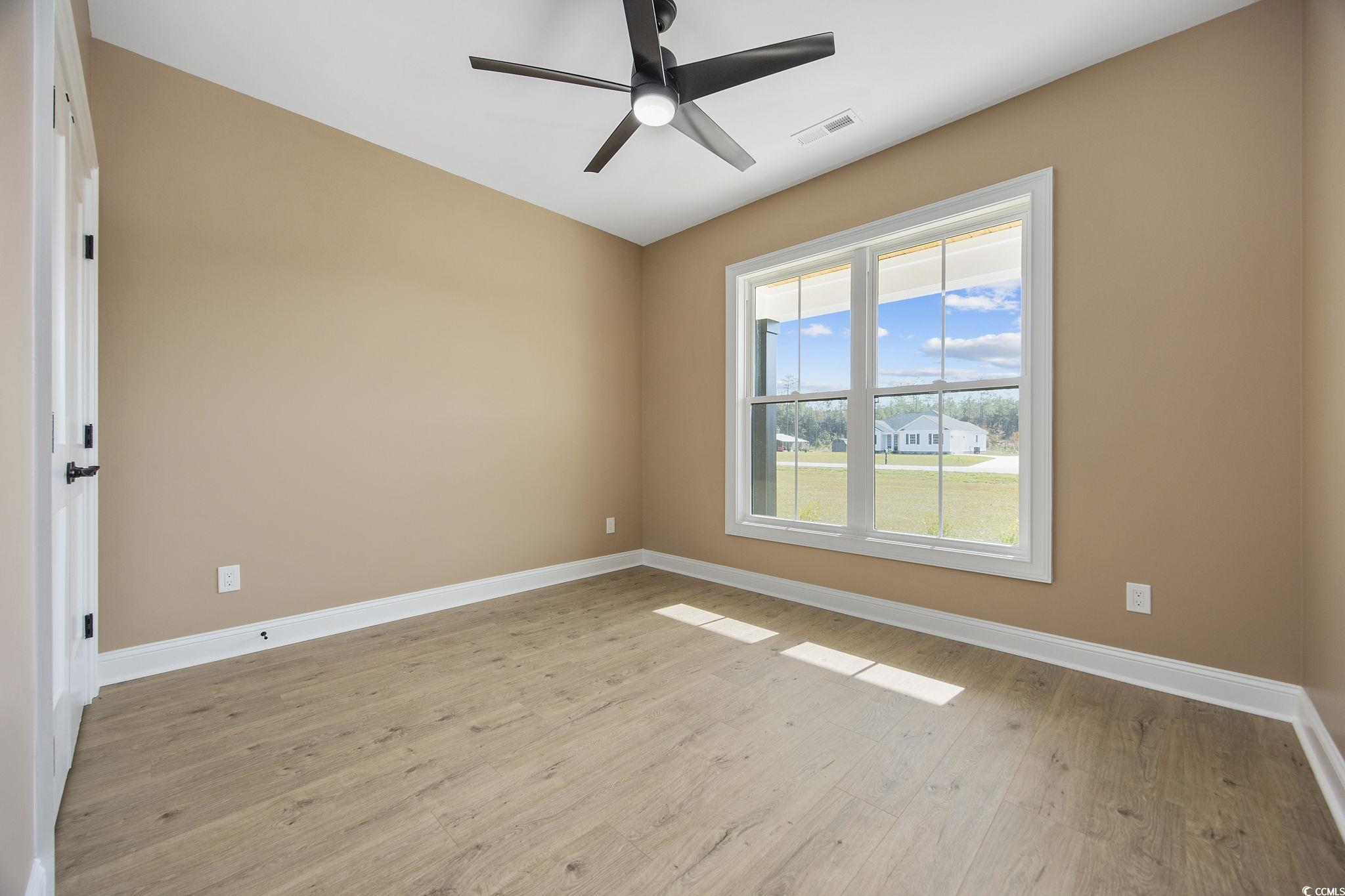 6914 Pauley Swamp Road Conway, SC 29527 - Photo 21 of 40 Unfurnished room featuring light wood-type floorin