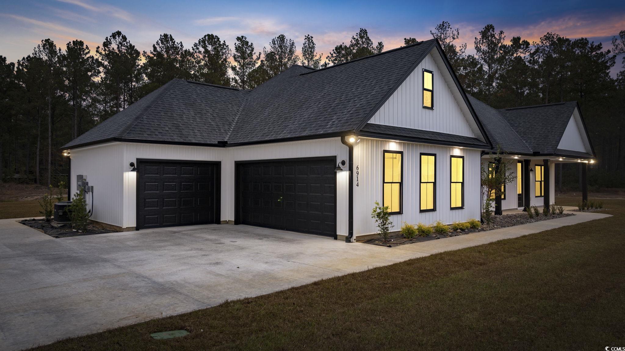 6914 Pauley Swamp Road Conway, SC 29527 - Photo 3 of 40 View of front of home featuring a lawn