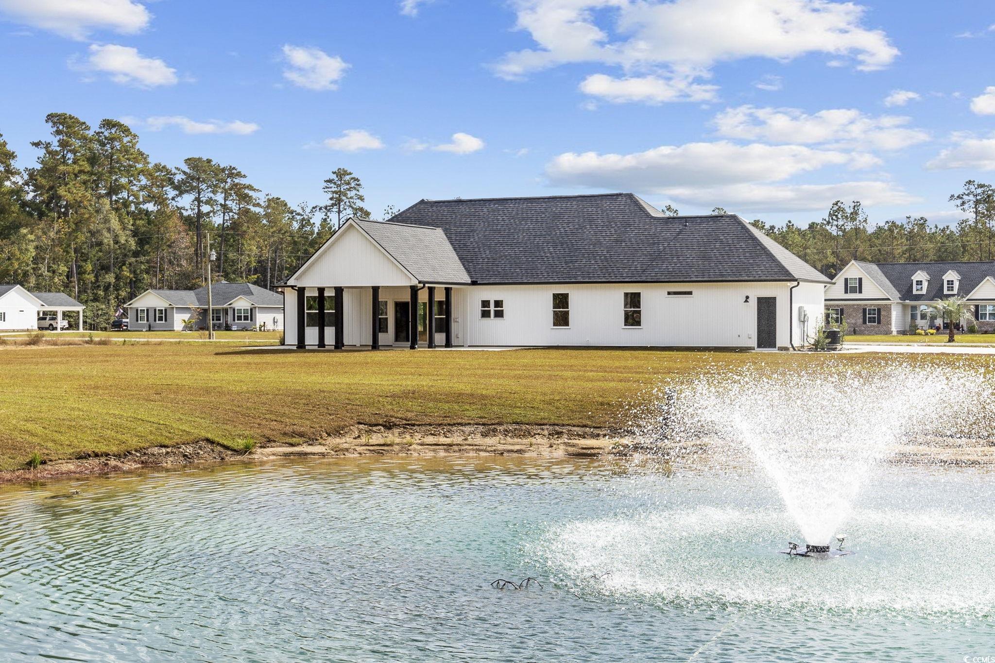 6914 Pauley Swamp Road Conway, SC 29527 - Photo 36 of 40 View of front facade with a water view and a front