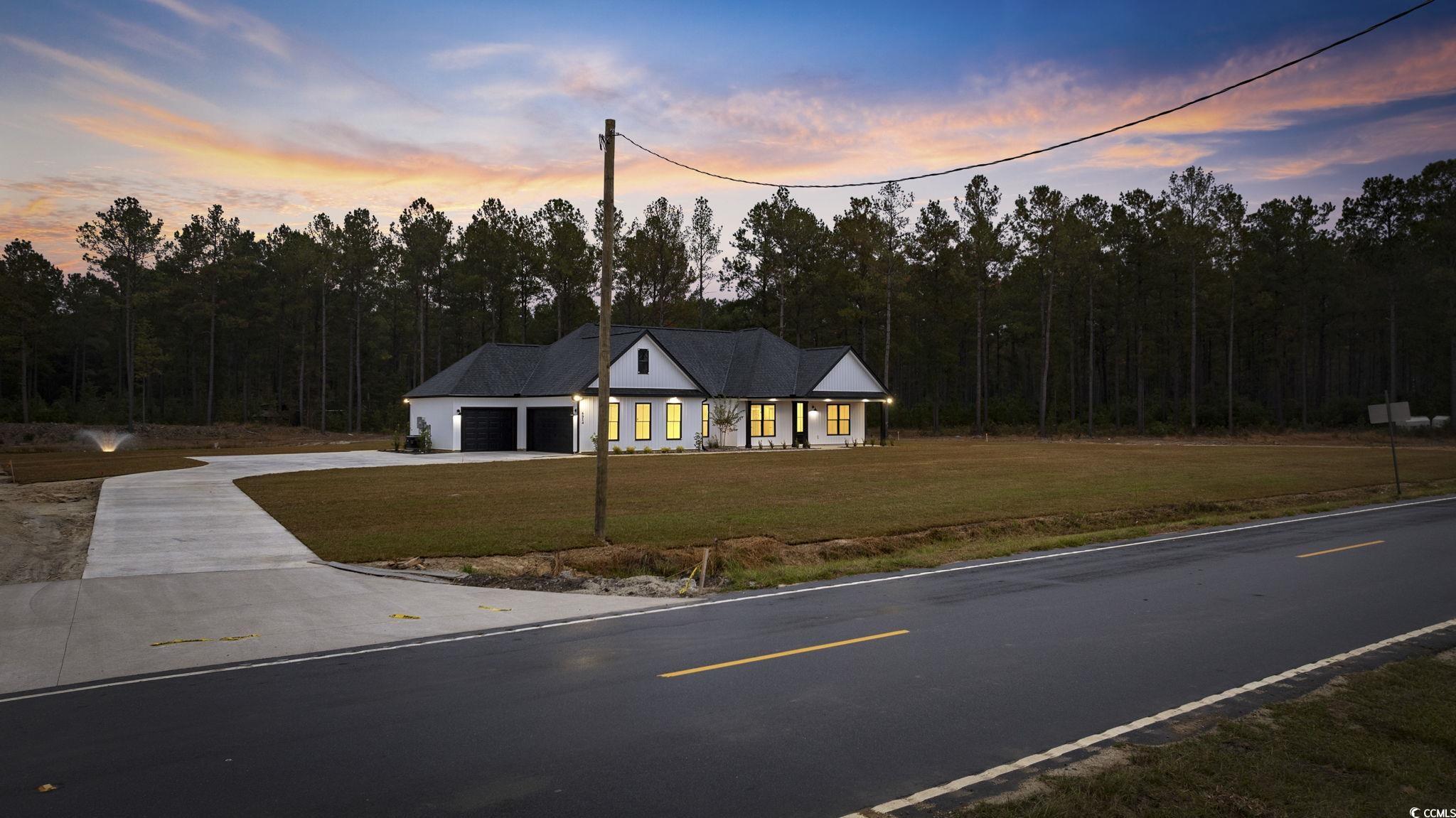 6914 Pauley Swamp Road Conway, SC 29527 - Photo 4 of 40 View of front of home with a lawn