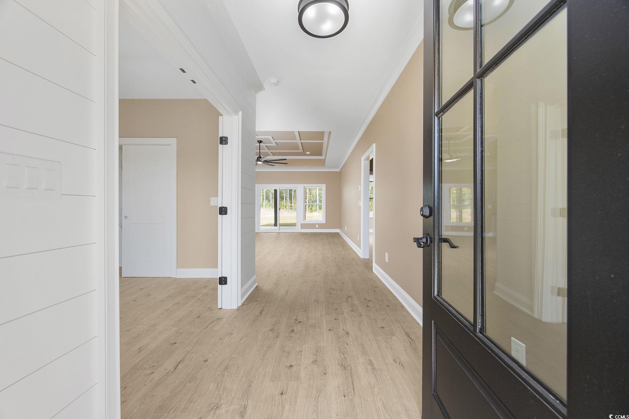 6914 Pauley Swamp Road Conway, SC 29527 - Photo 7 of 40 Hall featuring ornamental molding and light wood-t