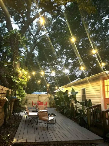 a view of a chairs and table on the wooden floor