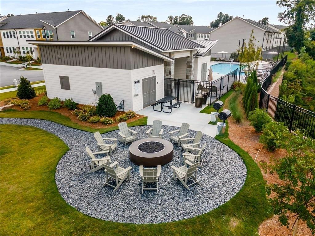 1585 Layton Lane Northwest Atlanta, GA 30318 - Photo 44 of 61 a view of a house with swimming pool and furniture