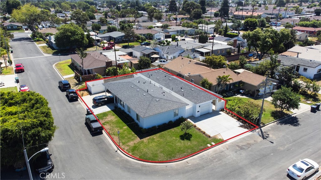 1056 Walter Avenue Tustin, CA 92780 - Photo 2 of 39 an aerial view of residential houses with outdoor space
