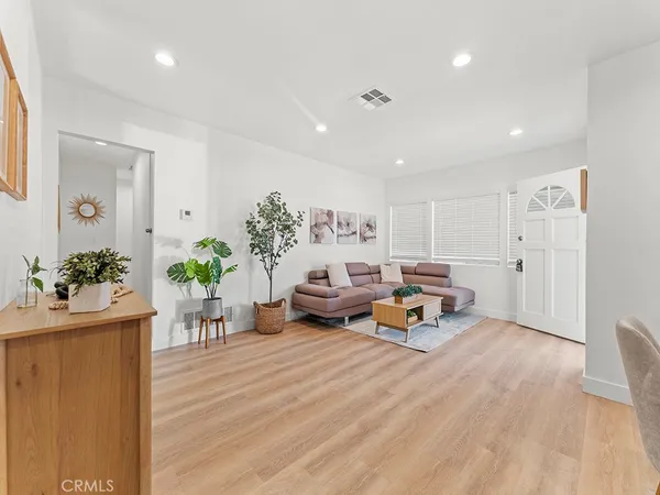 a playing room with furniture and a table