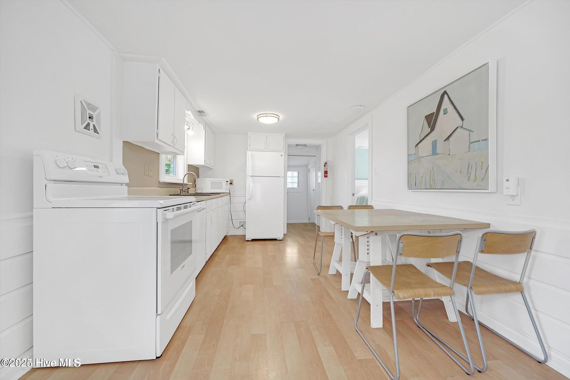 714 Canal Drive Carolina Beach, NC 28428 - Photo 6 of 16 16-dining_kitchen_area