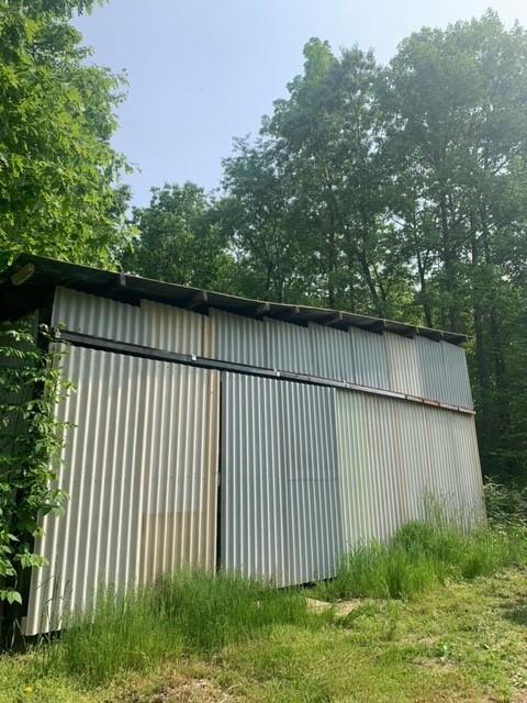 73 Carpenter Road Creekside, PA 15732 - Photo 5 of 15 a backyard of a house with lots of green space