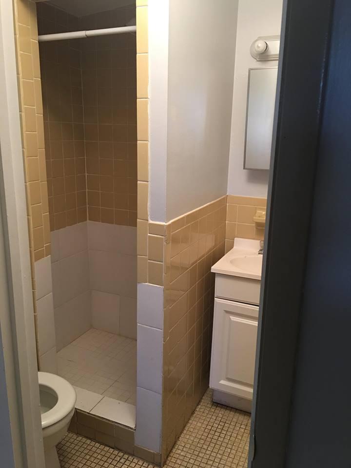 121 Southeast Bonita Court Port St. Lucie, FL 34983 - Photo 8 of 9 a bathroom with a shower and toilet