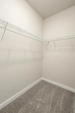 a view of a room with racks on the wall
