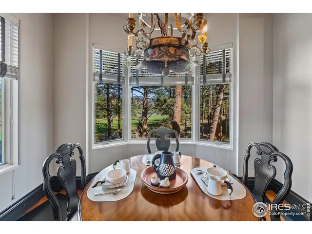 a table and a table with wine bottles