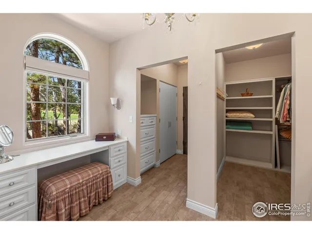a kitchen with a refrigerator and a stove