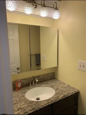 a bathroom with a toilet and a sink