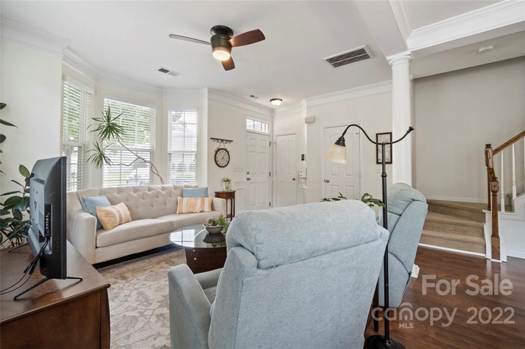 7383 Laurel Valley Road Charlotte, NC 28273 - Photo 15 of 37 a living room with furniture and a large window