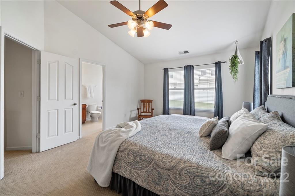7383 Laurel Valley Road Charlotte, NC 28273 - Photo 25 of 37 a bedroom with a bed and a window