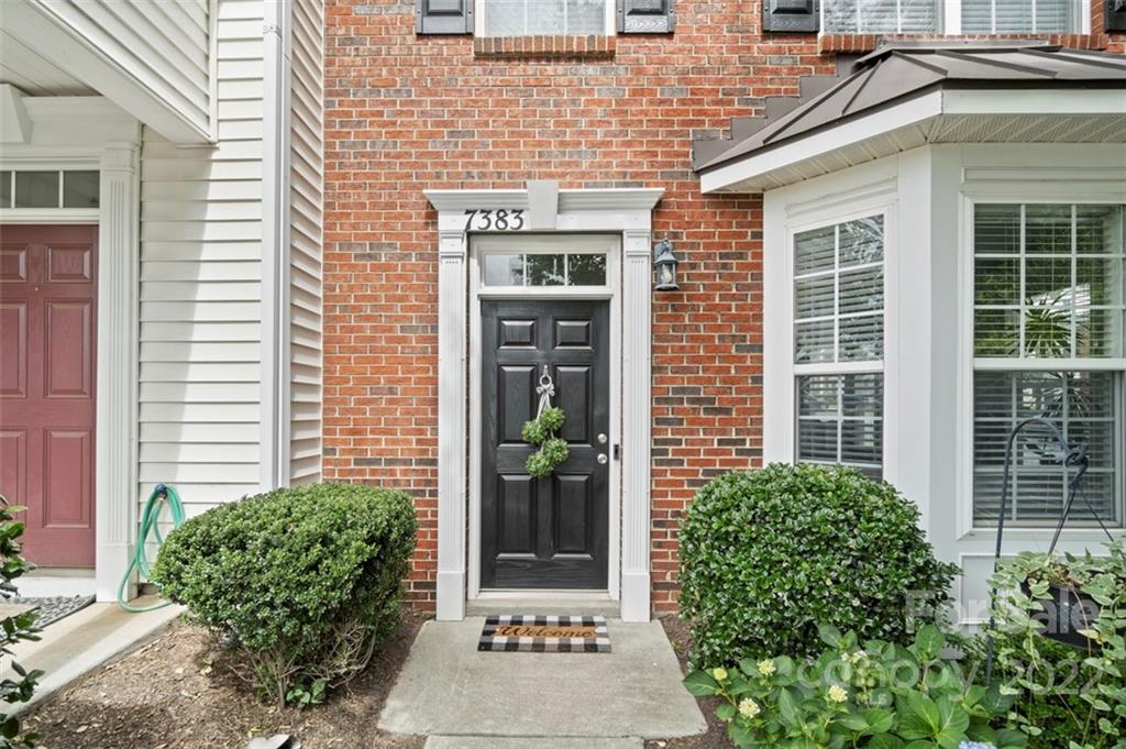 7383 Laurel Valley Road Charlotte, NC 28273 - Photo 3 of 37 a front view of a house