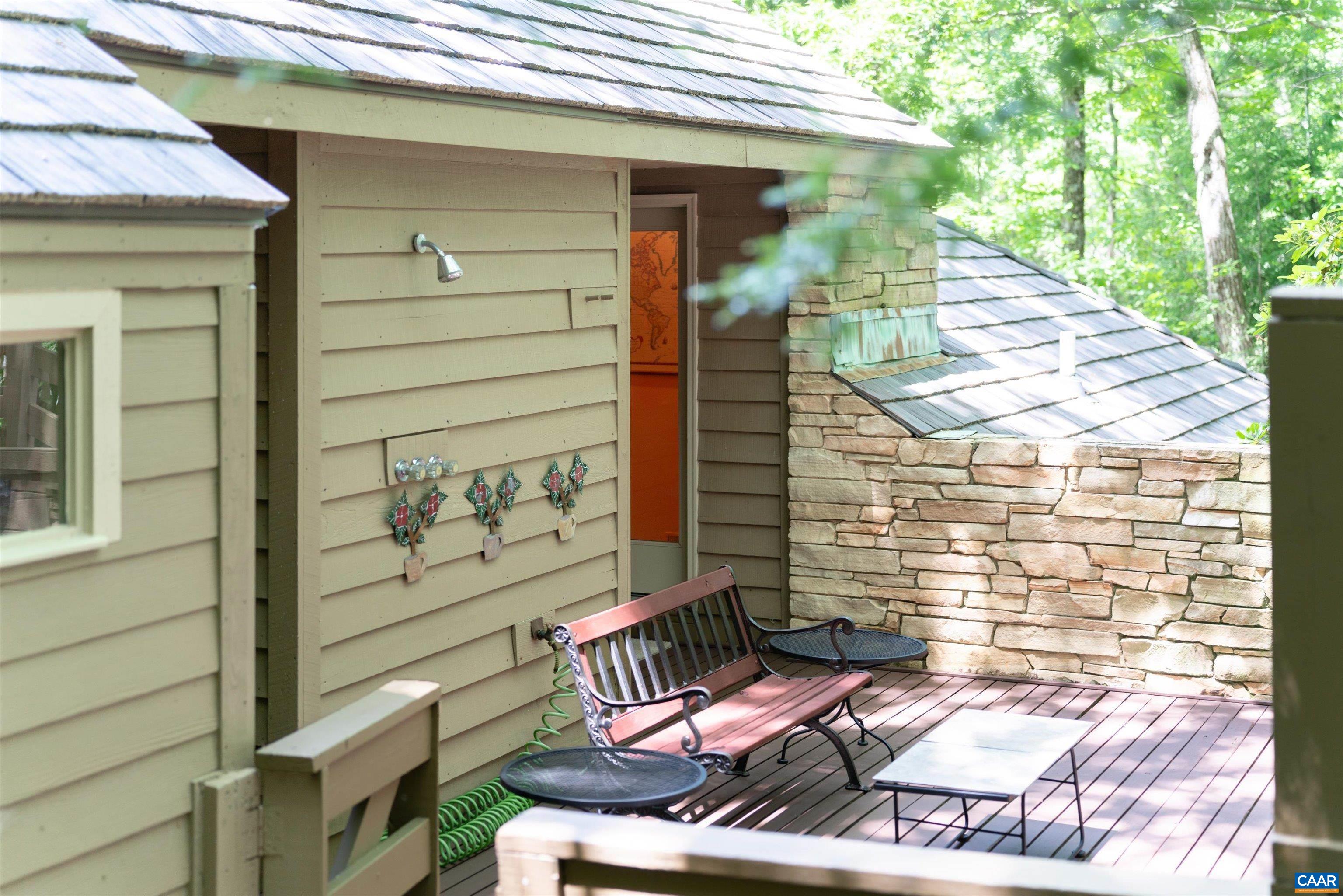 377 Devils Knob Loop Roseland, VA 22967 - Photo 41 of 75 Main level deck near sauna. Note outside shower.